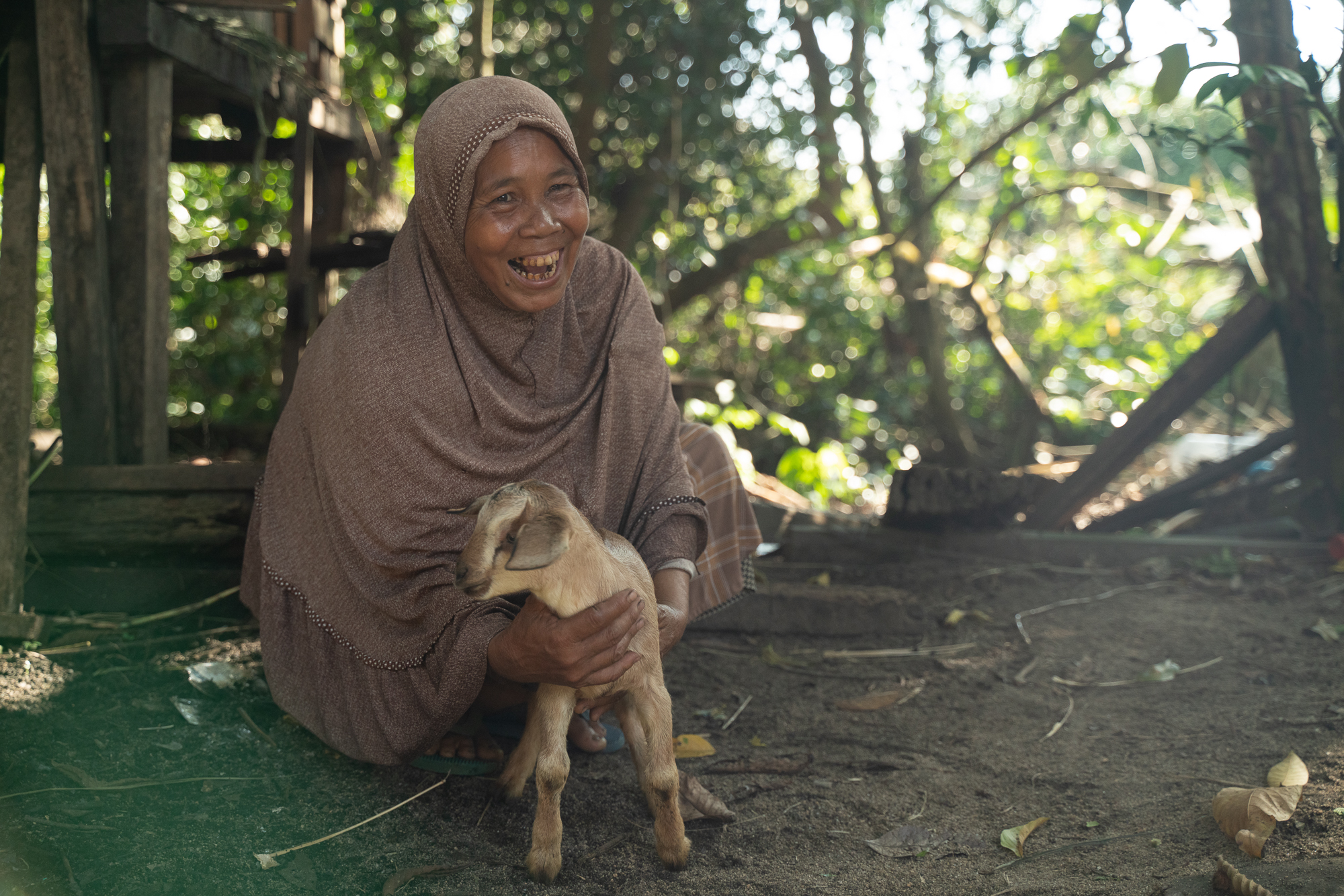 Photo of a widow with a goat