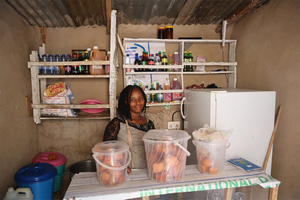 Woman sitting in her shop