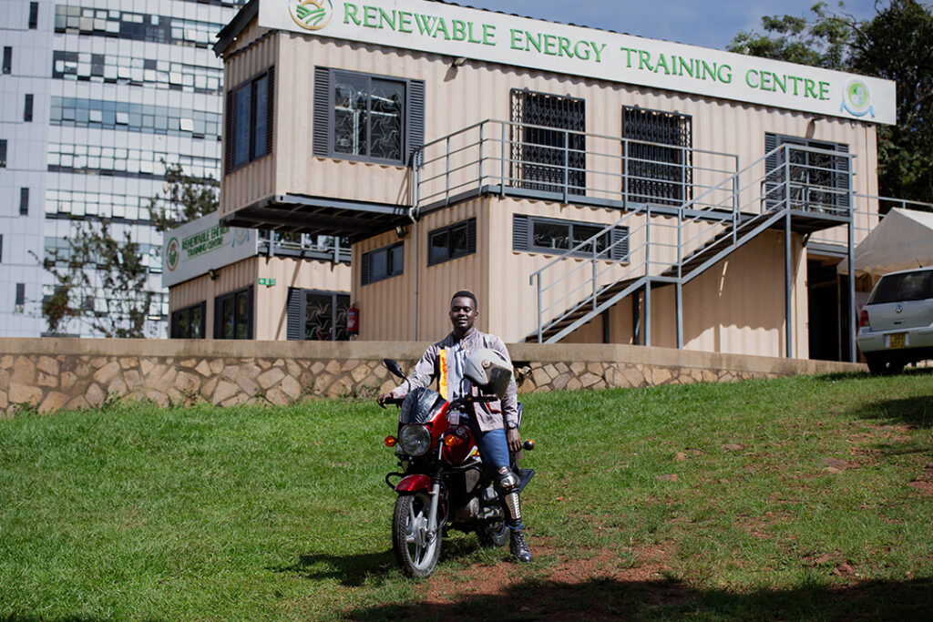 GoGo electric trainee outside the renewable energy training centre
